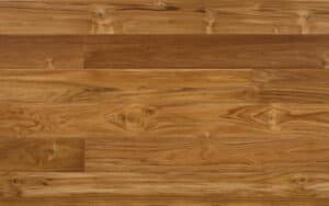 Questa foto mostra unelegante pavimentazione in teak africano, un legno duro e resistente che offre una straordinaria raffinatezza per qualsiasi design dinterni Il legno colorato è perfetto per pavimenti, mobili o qualsiasi altro elemento di arredo Perché non aggiungere un tocco di raffinatezza al tuo interno con il teak africano?