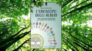 Una foto che ritrae un imponente albero in mezzo a un prato verdeggiante, circondato da un boschetto di vegetazione e da una rigogliosa foresta pluviale, accompagnato da un manifesto pubblicitario Una visione di grandezza e di bellezza che ci ricorda la straordinaria forza della terra